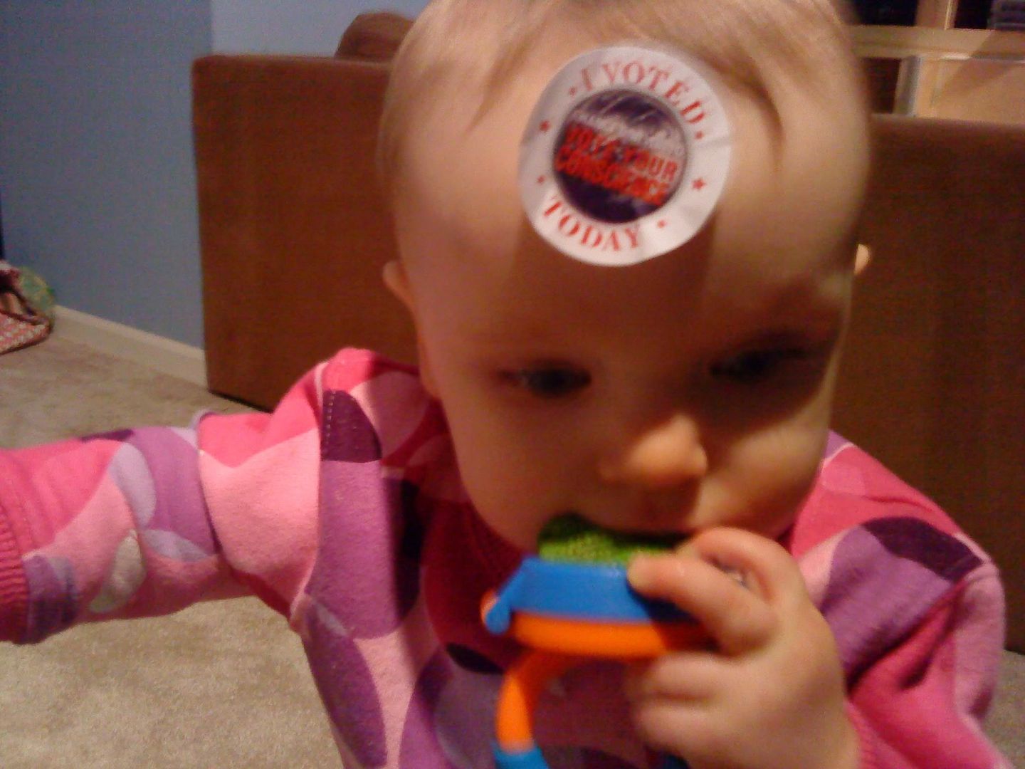 Ella with her voting sticker on